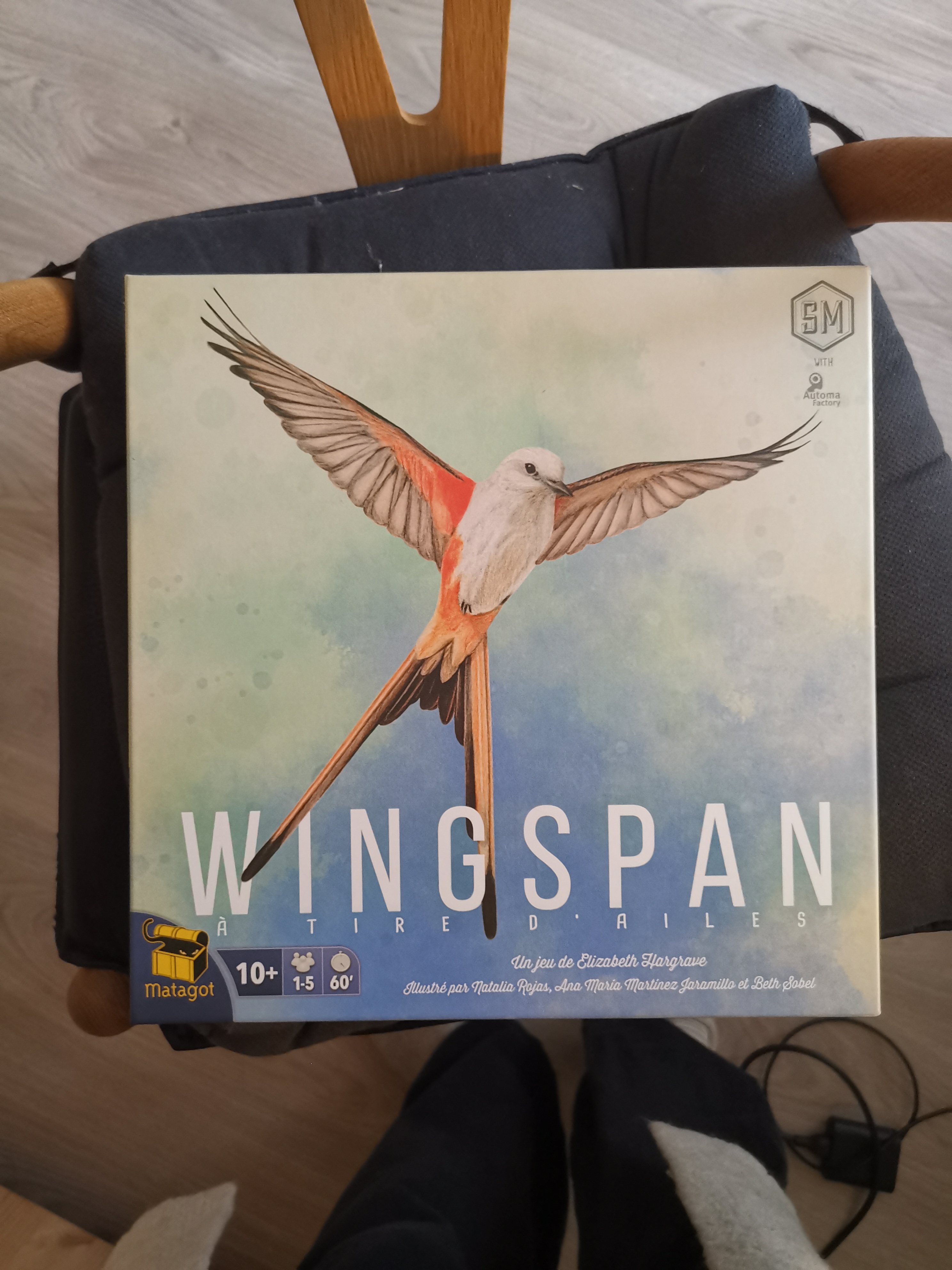 Boîte du jeu Wingspan avec une belle illustration d'oiseau dessus